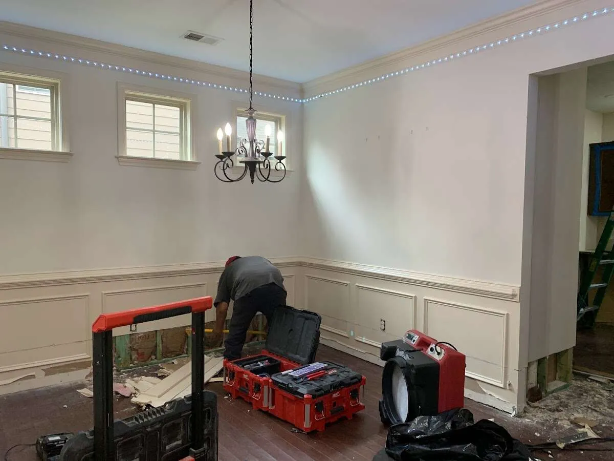 Restoration technician with professional equipment in Hopatcong